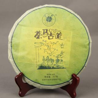 Solia 2013 Shouyixuan Tea Horse Ancient Road zelený puerh Qizi koláč 357g