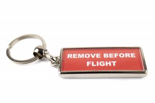 Přívěsek Remove Before Flight (kovový)