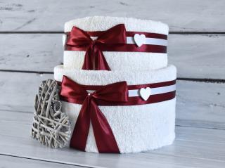 Dvoupatrový ručníkový dort pro dámy I. Barva: Smetanová s vínovou mašlí