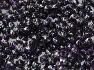 Mačkané korálky kytičky 4x7mm, barva fialovo-černá Balení: 1 ks