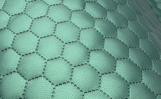 Koženka prošev tm zelený metalický hexagon kupon 0,5m