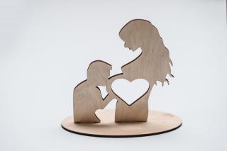 Dřevěný stojánek na ultrazvuk - muž a těhotná žena  (Dřevěný stojánek na ultrazvuk - muž a těhotná žena )