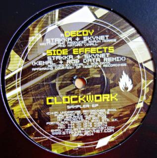 12  Stakka &amp; Skynet ‎– Clockwork (Sampler EP) (Pouze vinyl 1 z původního 2LP. Deska jen mírně ohraná s jemnými vlásenkami. Hraje fajn. Obal také lehce obnošený.)