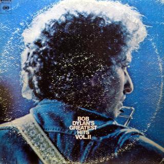2xLP Bob Dylan ‎– Bob Dylan's Greatest Hits Volume II (Obě desky jsou mírně ohrané, vlásenky a pár malých jemných povrchových oděrek. Hrají fajn, dobrý zvuk, jen mírný praskot v tichých pasážích. Rozevírací obal je obnošený, mnoho drobných oděrek. Velká f