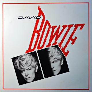 2xLP David Bowie ‎– Serious Business - Concert '83 (Neoficiální vydání živého záznamu z Olympiahalle v Mnichově v roce 1983. Deska 1 je ve velmi dobrém stavu. Na desce 2 několik vlásenek. Zvuk ok. Obal ve velmi dobrém stavu.)