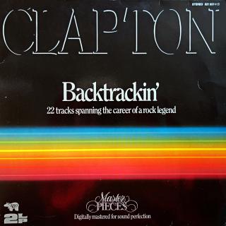 2xLP Eric Clapton - Backtrackin' (22 Tracks Spanning The Career Of A Rock Legend (První deska je více ohraná, mírný praskot v záznamu. Druhý vinyl je v pěkném stavu (90%). Rozevírací obal je v pěkném stavu, jen drobné oděrky na hranách.)