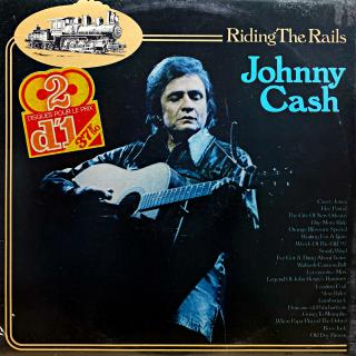 2xLP Johnny Cash – Riding The Rails (Obě desky jsou v pěkném stavu, jen lehce ohrané s jemnými vlásenkami. Hrají bezvadně, čistý zvuk. Rozevírací obal je taky v pěkném stavu, pouze drobné oděrky na hranách.)