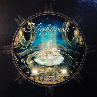 3xLP Nightwish ‎– Decades - An Archive Of Song 1996-2015 (V boxu s barevnou knížkou. Limitovaná edice. Na deskách jen drobné známky používání. Pěkný stav.)