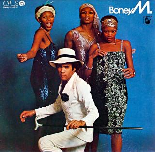 LP Boney M. ‎– Boney M. (Deska je v pěkném stavu, jen lehce ohraná s jemnými vlásenkami. Bezvadný a čistý zvuk i v pasážích mezi skladbami. Obal je v krásném stavu.)