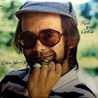 LP Elton John ‎– Rock Of The Westies (Včetně přílohy a orig. vnitřního obalu s potiskem. Na desce pár povrchových oděrek. Nicméně hraje fajn, bezvadný zvuk. Obal je v krásném stavu.)