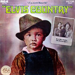 LP Elvis Presley ‎– Elvis Country (I'm 10,000 Years Old) (Deska je trochu ohraná, vlásenky i jemné povrchové oděrky. Hraje dobře, mírný praskot v záznamu. Obal má proseknuté hrany, ale potisk je z obou stran pěkný (Album, India, 1971, Country Rock, Countr