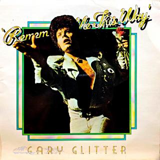 LP Gary Glitter – Remember Me This Way (Deska je v pěkném a lesklém stavu s ultra-jemnými vlásenkami a jednou velmi jemnou povrchovou oděrkou. Hraje bezvadně, výborný a čistý zvuk. Obal je v dobrém stavu s několika oděrkami viz foto a malým výsekem (impor