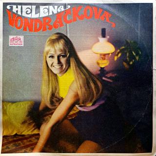 LP Helena Vondráčková ‎– Růže Kvetou Dál (Deska je ohraná s jemnými oděrkami a mnoha vlásenkami. Nicméně hraje dobře, jen mírný praskot v záznamu. Obal je taky trochu obnošený s ošoupanými hranami.)
