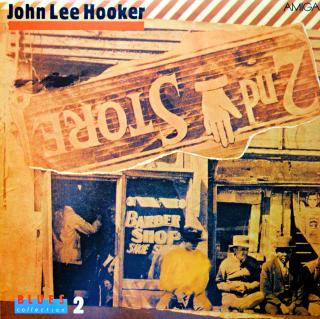 LP John Lee Hooker ‎– Blues Collection 2 (Deska je v krásném a lesklém stavu, jen pár jemných vlásenek pod ostrým světlem. Bezvadný a čistý zvuk i v pasážích mezi skladbami. Obal je taky lesklý a ve výborné kondici.)
