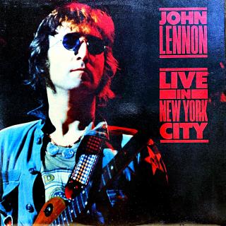 LP John Lennon ‎– Live In New York City (Deska je trochu ohraná s jemnými vlásenkami a dvěma velmi jemnými povrchovými oděrkami. Hraje bezvadně, výborný a čistý zvuk i v tichých pasážích. Obal je lesklý a v perfektní kondici.)