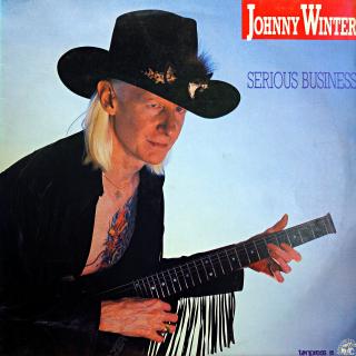 LP Johnny Winter ‎– Serious Business (Deska v pěkném stavu, jen lehké stopy používání. Bezvadný a čistý zvuk. Obal taky v pěkném stavu (Album, Poland, 1986, Blues Rock, Electric Blues, Modern Electric Blues))
