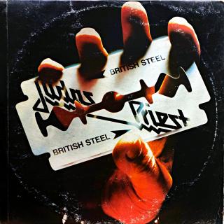 LP Judas Priest – British Steel (Deska je ohraná, posetá jemnými vlásenkami. Hraje fajn, velmi dobrý zvuk, jen mírný praskot v tichých pasážích. Obal je trochu obnošený, hrana spravená páskou viz foto.)