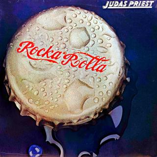LP Judas Priest – Rocka Rolla (Deska je trochu ohraná, mnoho jemných vlásenek. Hraje fajn, velmi dobrý zvuk, jen mírný praskot v tichých pasážích. Obal je pěkný, pouze lehké stopy používání a malá oděrka na zadní straně.)