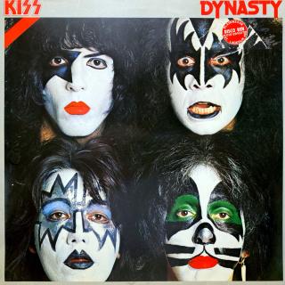 LP Kiss ‎– Dynasty (Deska je trochu ohraná s vlásenkami i drobnými povrchovými oděrkami. Hraje dobře, jen mírný praskot v tichých pasážích. Obal má proseknutý hřbet a natrhnutý potisk na čelní straně.)
