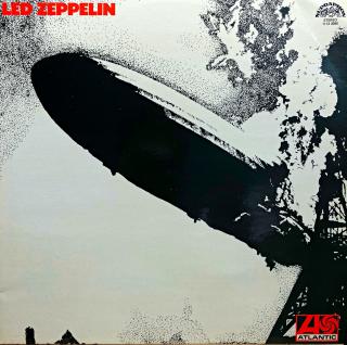 LP Led Zeppelin ‎– Led Zeppelin (Deska je v lesklém a krásném stavu, jen lehce ohraná s jemnými vlásenkami. Hraje skvěle, výborný a čistý zvuk i v tichých pasážích. Obal je lesklý a v perfektní kondici. Orig. vnitřní obal s potiskem.)
