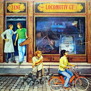 LP Locomotiv GT ‎– Zene (Mindenki Másképp Csinálja) = Music (Everyone Does His.. (Deska je mírně ohraná s vlásenkami. Hraje fajn, stále velmi dobrý a čistý zvuk. Obal má natrhnutou čelní stranu cca 5cm, jinak jen lehce obnošený. English version.)