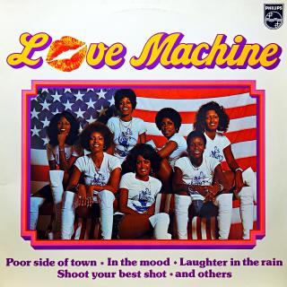 LP Love Machine ‎– Love Machine (Deska ve velmi pěkném stavu, pouze jemné vlásenky. Obal je krásný, jen velmi lehké stopy používání.)