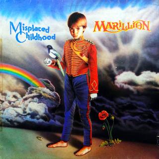 LP Marillion ‎– Misplaced Childhood (Deska je trochu ohraná, vlásenky i pár velmi jemných kosmetických oděrek. Hraje fajn, bezvadný a čistý zvuk. Rozevírací obal má hranu spravenou páskou viz foto, ale potisk je všude pěkný.)