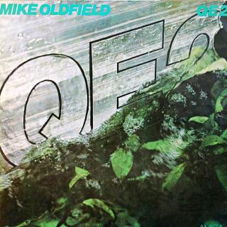 LP Mike Oldfield ‎– QE2 (Deska v dobrém stavu pouze s jemnými vlásenkami. Obal také pěkný, jen trochu obroušené hrany.)