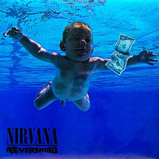 LP Nirvana ‎– Nevermind (Včetně přílohy. Deska je mírně ohraná, mnoho jemných vlásenek a pár velmi jemných povrchových oděrek. Hraje fajn, výborný zvuk, mírný praskot v tichých pasážích. Na začátku desky praskot výraznější. Obal je v krásném a lesklém sta