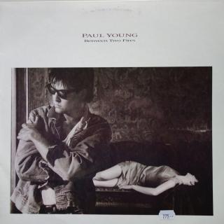 LP Paul Young ‎– Between Two Fires ((1986) ALBUM)