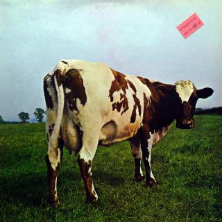 LP Pink Floyd ‎– Atom Heart Mother (Deska je v pěkném stavu, jen lehce ohraná. Jemné vlásenky a pár drobných povrchových oděrek. Hraje fajn, velmi dobrý zvuk, jen v jednom místě jsem slyšel jemný lupanec asi tři otočky. Obal je v krásném stavu, nálepku se