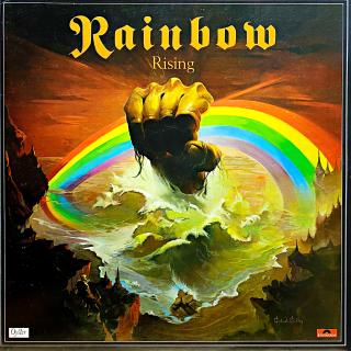 LP Rainbow ‎– Rising (Deska je v krásném a lesklém stavu, pouze několik jemných vlásenek. Hraje perfektně, výborný a čistý zvuk i v tichých pasážích. Rozevírací obal je taky velmi pěkný, jen lehké stopy používání a trošku naražený jeden roh.)