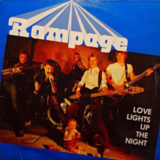 LP Rampage ‎– Love Lights Up The Night (Deska je trochu ohraná, mnoho jemných vlásenek. Obal také trochu obnošený s odřenými hranami.)