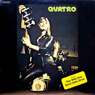 LP Suzi Quatro – Quatro (Deska je v krásném a lesklém stavu, jen pár vlásenek. Hraje bezvadně, výborný a čistý zvuk, pouze mírný praskot na začátku. Obal je lesklý a krásný, lehce naražený jeden roh.)