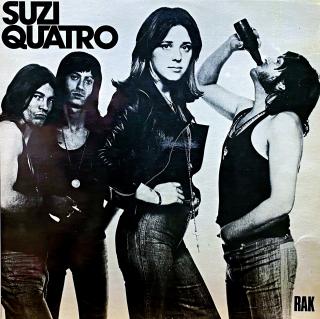 LP Suzi Quatro – Suzi Quatro (Deska je v dobrém a lesklém stavu, mírně ohraná s jemnými vlásenkami. Hraje bezvadně, výborný zvuk, jen mírný praskot mezi skladbami. Obal je lesklý a v perfektní kondici.)