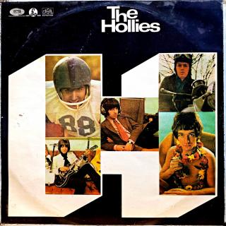 LP The Hollies ‎– The Hollies (Deska je v pěkném a lesklém stavu, jen lehce ohraná s jemnými vlásenkami. Hraje skvěle, výborný a čistý zvuk, jen na začátku mírný praskot. Obal je v horším stavu, hrany olepené páskou viz fotky.)