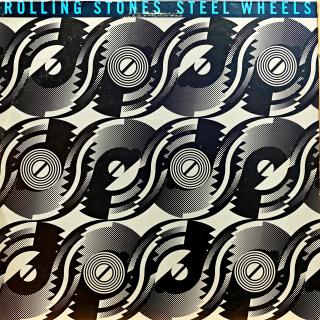 LP The Rolling Stones ‎– Steel Wheels (Deska je v krásném a lesklém stavu, pouze velmi lehké stopy používání. Hraje výborně, bezvadný a čistý zvuk i v tichých pasážích. Obal je taky pěkný, jen několik jemných malých oděrek.)