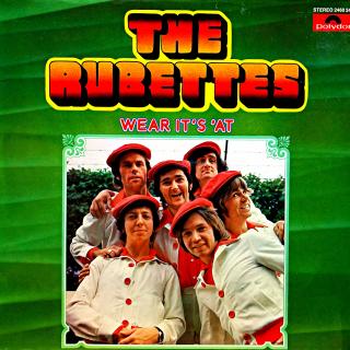 LP The Rubettes – Wear It's 'At (Deska je v krásném a lesklém stavu, jen pár jemných vlásenek a jedna drobná jemná oděrka na začátku. Zde je pár otoček slyšet jemný prskanec. Kromě toho perfektní a čistý zvuk. Obal je lesklý a krásný.)
