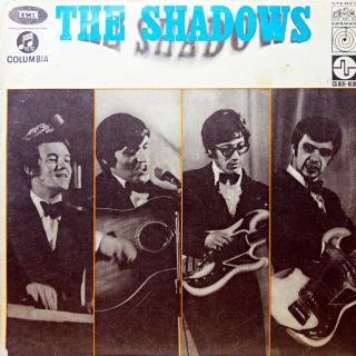 LP The Shadows ‎– The Shadows (Deska je v krásném a lesklém stavu, jen pár ultra-jemných vlásenek pod ostrým světlem. Bezvadný a čistý zvuk i v pasážích mezi skladbami. Obal je taky pěkný, jen lehké stopy používání.)