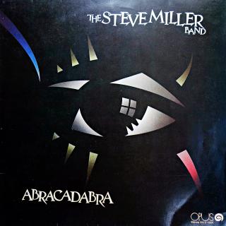 LP The Steve Miller Band ‎– Abracadabra (Deska v pěkném stavu, pár vlásenek. Obal také pěkný, jen drobné stopy používání (Album, Czechoslovakia, 1984, Pop-Rock))