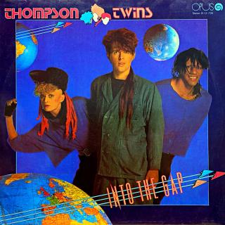 LP Thompson Twins – Into The Gap (Deska i obal jsou v krásném a lesklém stavu, jen pár jemných vlásenek.)