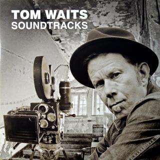 LP Tom Waits ‎– Soundtracks (Bílý vinyl. Unofficial Release. Na desce jen velmi jemné vlásenky. Obal v bezvadném stavu. Na vinylu jsou černé šmouhy a drobnější skvrny. Nejedná se o nečistotu, nelze odstranit. Asi zbytky zalisovaného černého vinylu z předc