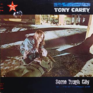 LP Tony Carey ‎– Some Tough City (Deska v dobrém stavu, jen lehce ohraná s jemnými vlásenkami. Obal také v dobrém stavu, drobné oděrky na hranách.)