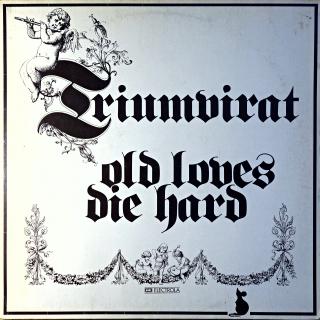 LP Triumvirat ‎– Old Loves Die Hard (Deska je mírně ohraná, hodně jemných vlásenek. Nicméně hraje fajn, pouze mírný praskot v tichých pasážích. Obal jen lehce obnošený.)