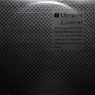 LP Ultravox ‎– Lament (Deska v pěkném stavu, pár jemných vlásenek. Obal lehce obnošený s oděrkami na hranách.)
