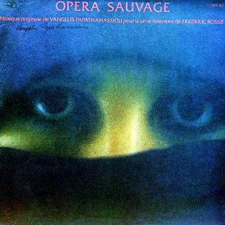 LP Vangelis Papathanassiou – Opera Sauvage (Deska je v pěkném a lesklém stavu, pouze velmi jemné vlásenky. Hraje bezvadně, výborný a čistý zvuk. Rozevírací obal je taky pěkný, pouze jemné oděrky na hranách.)