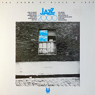 LP Various ‎– Jazz 2000 Vol.2 (Deska v dobrém stavu, pár vlásenek a drobných povrchových oděrek. Rozevírací obal má utržený kousek potisku na čelní straně, jinak pěkný stav.)