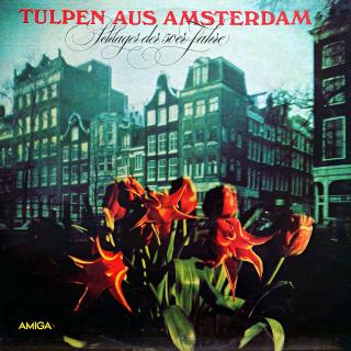 LP Various – Tulpen Aus Amsterdam - Schlager Der 50er Jahre (Deska je v pěkném a lesklém stavu, jen lehce ohraná s jemnými vlásenkami. Hraje fajn, bezvadný a čistý zvuk i v pasážích mezi skladbami. Obal je v perfektní kondici.)