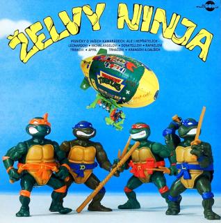 LP Various – Želvy Ninja (Deska je mírně ohraná s mnoha jemnými vlásenkami a několika velmi jemnými povrchovými oděrkami. Hraje fajn, dobrý zvuk. Obal je v krásném a lesklém stavu.)