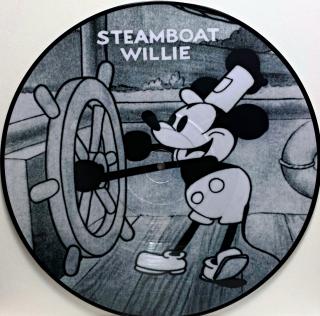 LP Walt Disney – Steamboat Willie (Vinyl s grafikou. Deska je v bezvadném a lesklém  stavu, jako nová. Bílý, tvrdý obal bez potisku je taky v perfektním stavu.)